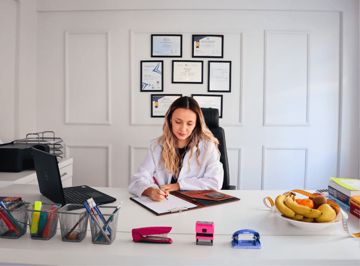 Student researching universities on a laptop