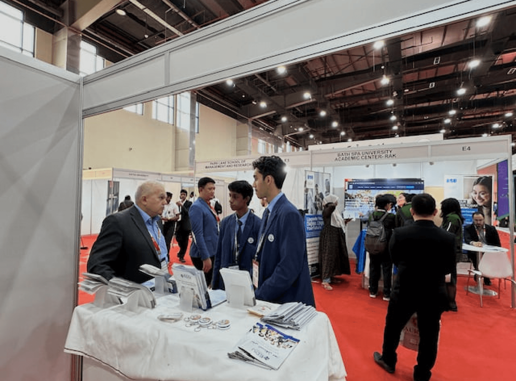 Students at the Edu Consultancy expo booth